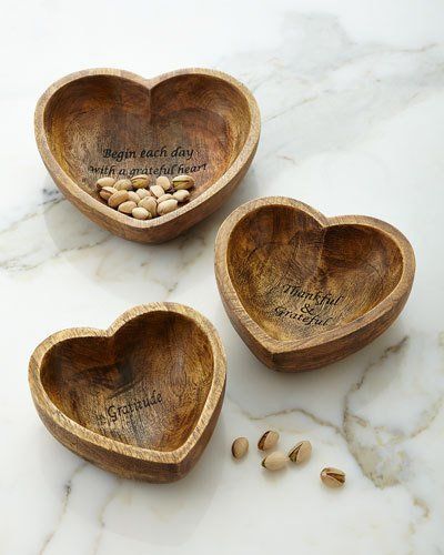 Handcrafted wooden salad bowl with fresh greens."